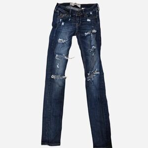 Hollister navy blue skinny jeans with distressed details